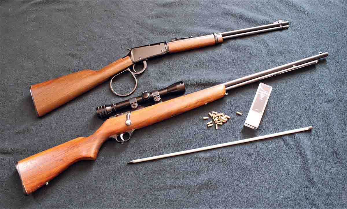 Most modern rimfire rifles with tube magazines, whatever the action, require removing the spring-loaded “inner tube” from the primary tube for reloading. At top is a .22 from Henry Repeating Arms. The bottom rifle is a Marlin 81, which holds up to two dozen .22 Shorts.